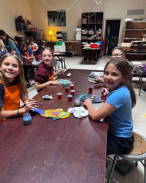 elementary students in art class